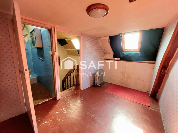 Maison de ville avec cour idéale investisseur à rénover