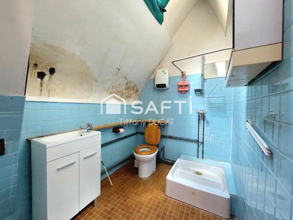 Maison de ville avec cour idéale investisseur à rénover