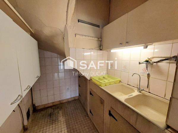 Maison de ville avec cour idéale investisseur à rénover