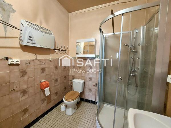 Maison de ville avec cour idéale investisseur à rénover