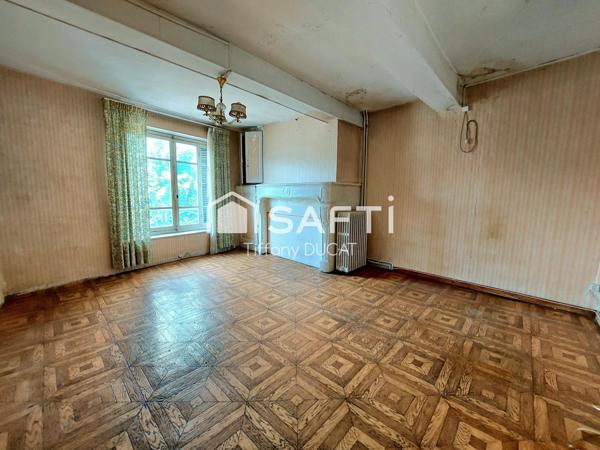 Maison de ville avec cour idéale investisseur à rénover