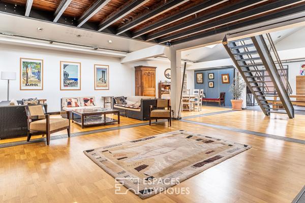 Loft avec patio dans un ancien garage automobile