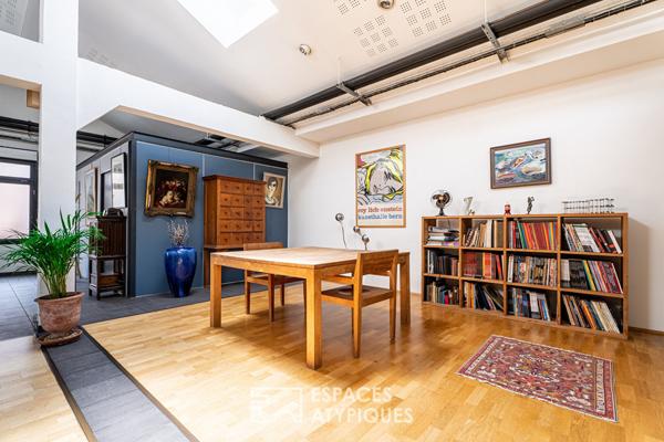 Loft avec patio dans un ancien garage automobile