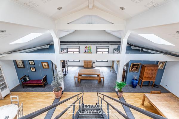 Loft avec patio dans un ancien garage automobile