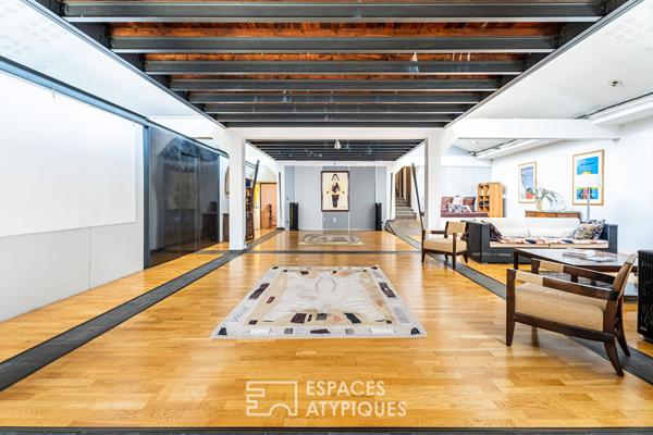 Loft avec patio dans un ancien garage automobile