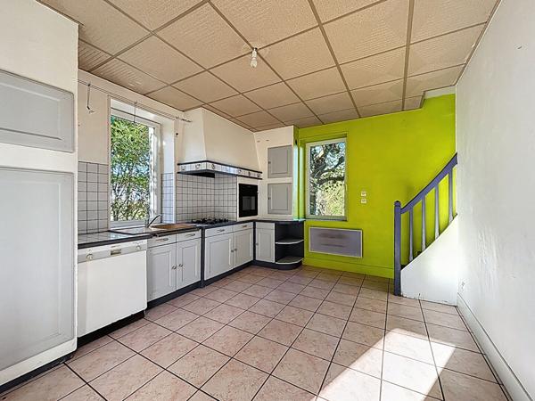 Maison ancienne à vendre au coeur de Juigné sur Loire sur une belle parcelle close de plus de 800m²