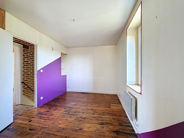 Maison ancienne à vendre au coeur de Juigné sur Loire sur une belle parcelle close de plus de 800m²