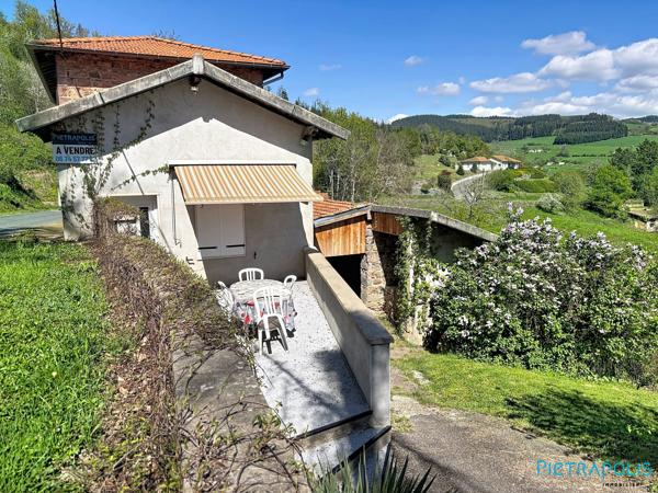 Maison à la campagne avec terrain et dépendances