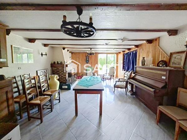 Maison de caractère à rénover avec de beaux volumes et un terrain de 67 ares