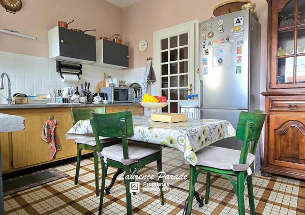 Maison centre ville avec rez de jardin et garage