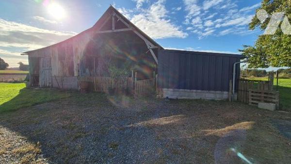 ERNEE en campagne : fermette rénovée comprenant:
- Au rez-de-chaussée: entrée avec placards , ...