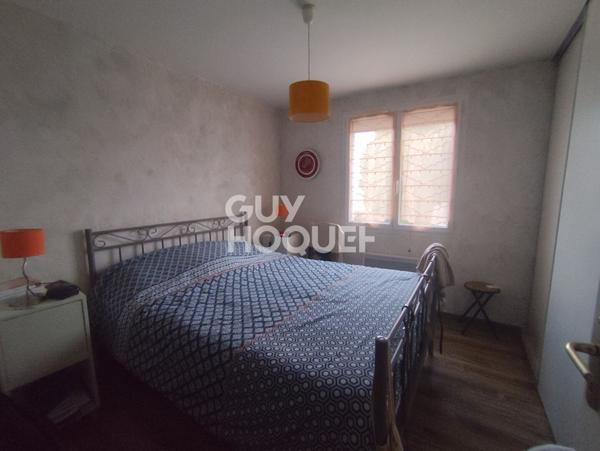 Maison Bussy Albieux de plain pied sur un terrain arboré de 2849 m²