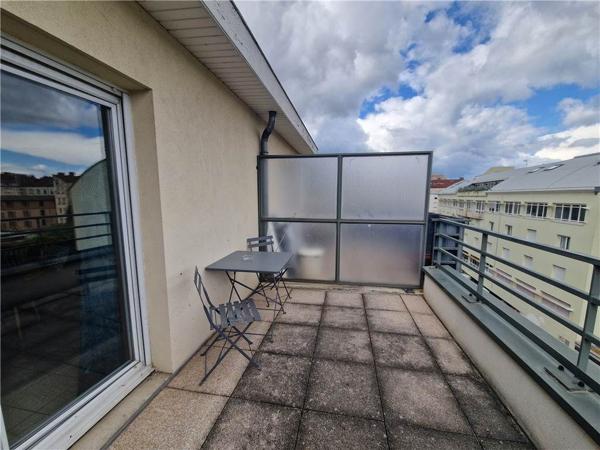 T1 meublé avec terrasse privative + Place de stationnement