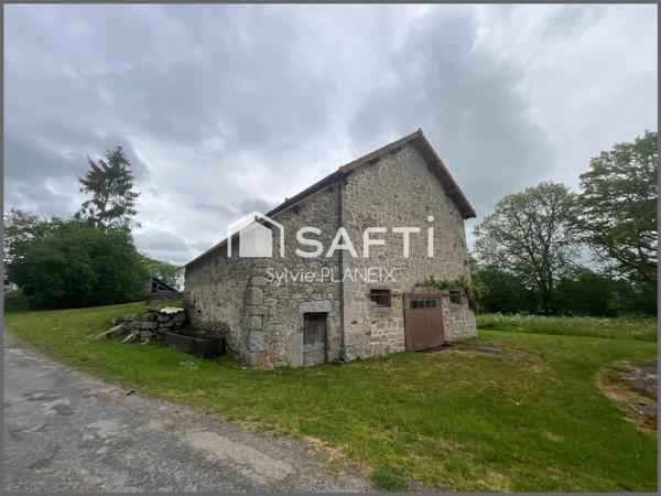 Magnifique ensemble immobilier avec grange, cave, étable, atelier, terrain agricole à Flayat !