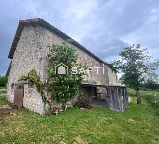 Magnifique ensemble immobilier avec grange, cave, étable, atelier, terrain agricole à Flayat !