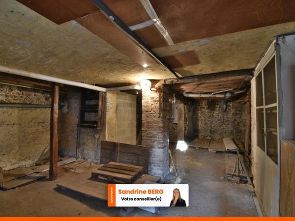 Maison de ville à rénover avec jardin – proche centre-ville