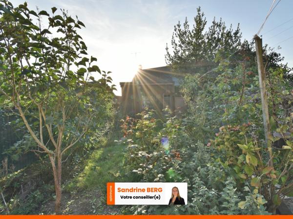 Maison de ville à rénover avec jardin – proche centre-ville