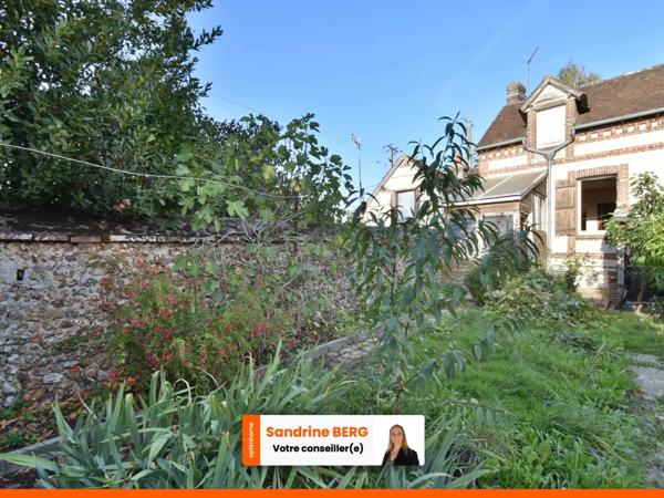 Maison de ville à rénover avec jardin – proche centre-ville