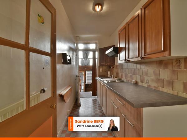 Maison de ville à rénover avec jardin – proche centre-ville