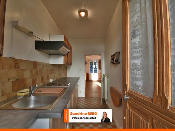 Maison de ville à rénover avec jardin – proche centre-ville