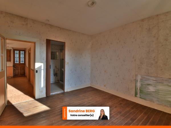 Maison de ville à rénover avec jardin – proche centre-ville