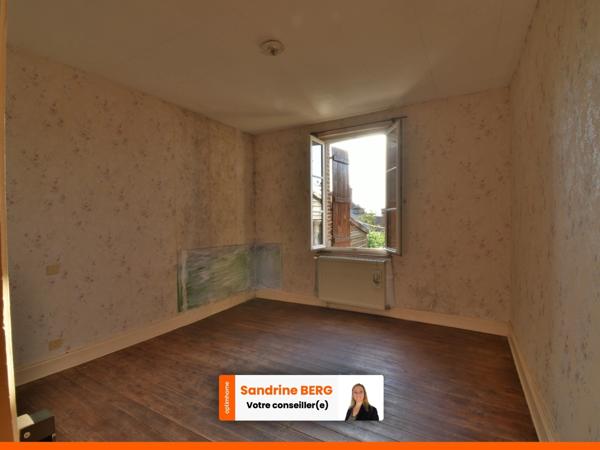 Maison de ville à rénover avec jardin – proche centre-ville