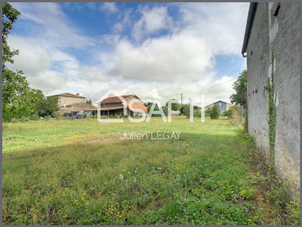 GRAND TERRAIN CONSTRUCTIBLE EN CENTRE BOURG