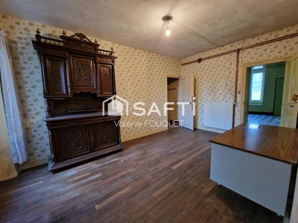 Situé à Vaudoncourt bel ensemble immobilier de caractère avec dépendances sur grand terrain