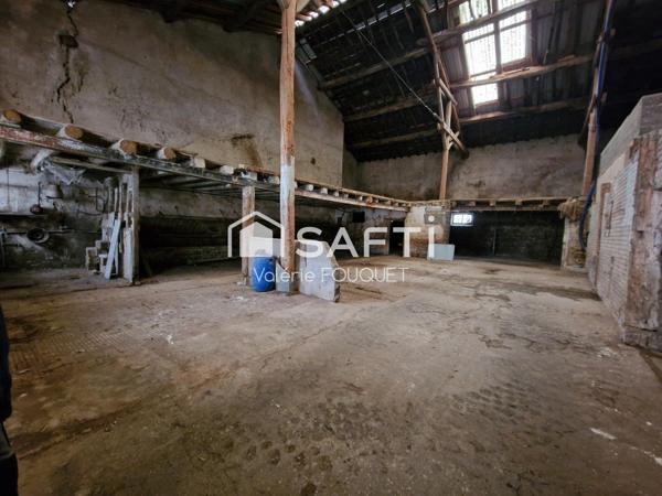 Situé à Vaudoncourt bel ensemble immobilier de caractère avec dépendances sur grand terrain