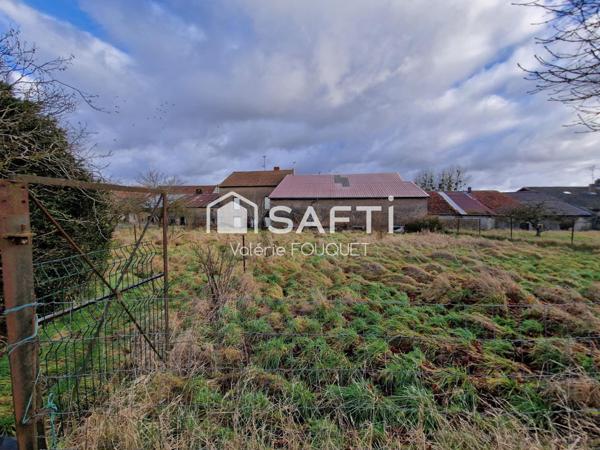 Situé à Vaudoncourt bel ensemble immobilier de caractère avec dépendances sur grand terrain