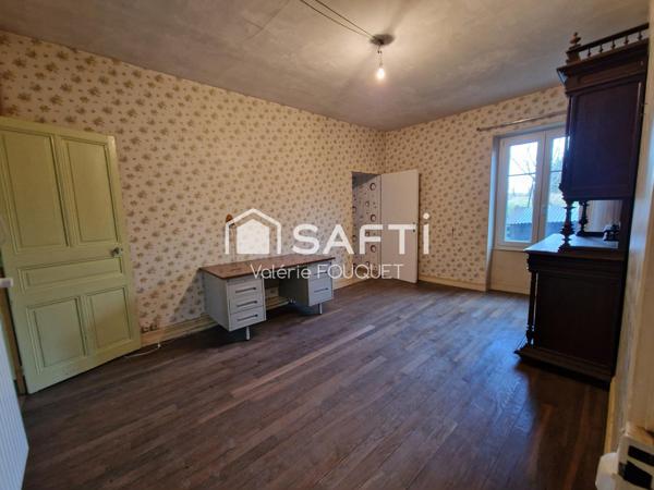 Situé à Vaudoncourt bel ensemble immobilier de caractère avec dépendances sur grand terrain