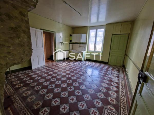 Situé à Vaudoncourt bel ensemble immobilier de caractère avec dépendances sur grand terrain