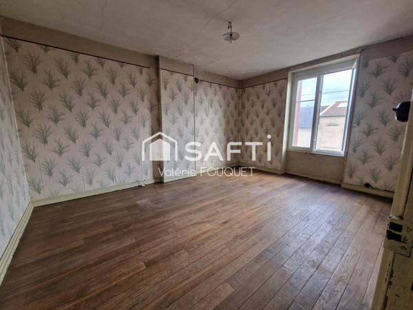 Situé à Vaudoncourt bel ensemble immobilier de caractère avec dépendances sur grand terrain