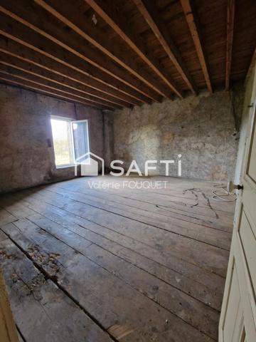 Situé à Vaudoncourt bel ensemble immobilier de caractère avec dépendances sur grand terrain