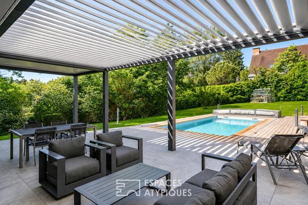 Propriété de caractère avec extension contemporaine et piscine
