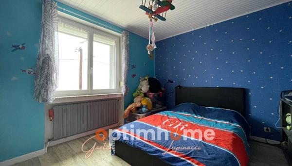 Maison 2 chambres, séjour et garage, avec vue dégagée – Quartier calme et recherché à Moyeuvre-Grande