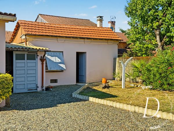 MARCIAC – MAISON DE PLAIN-PIED AVEC GRANDES DÉPENDANCES, GARAGES ET VÉRANDA