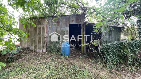 Terrain constructible arboré, calme et potentiel.