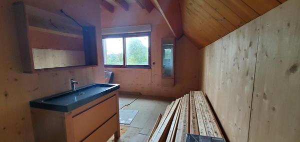 Maison à ossature bois en cours d'achèvement