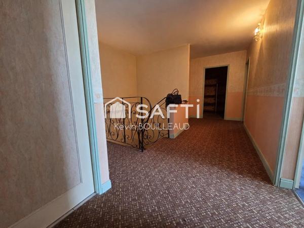 Calme, proche des commodités, 334m² à rénover avec garage.