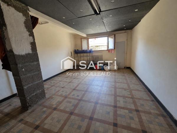 Calme, proche des commodités, 334m² à rénover avec garage.