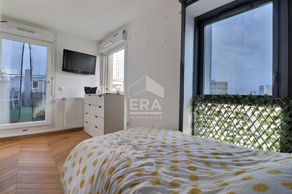 Rare sur le marché : duplex récent avec 70 m² d'extérieurs et vue La Défense / Tour Eiffel