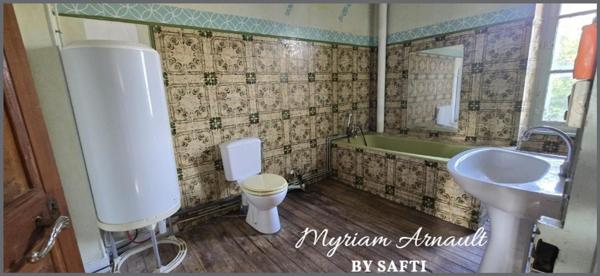 MAISON 3 NIVEAUX AVEC GARAGE ET JARDIN A RENOVER