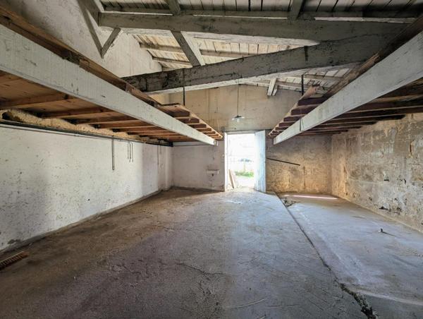 Garage 80 m² avec jardin