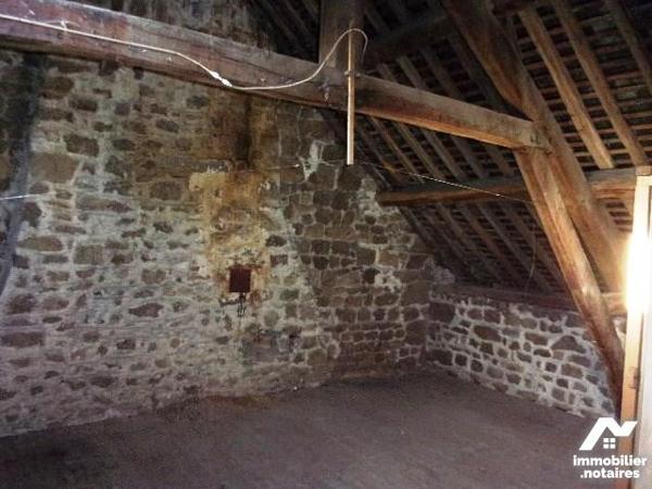 PUTANGES:  centre ville: Maison en pierres 4 chambres