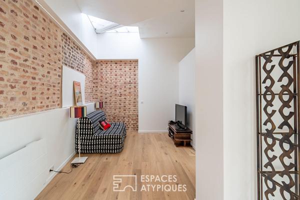 Maison d’architecte à la toiture papillon avec vue