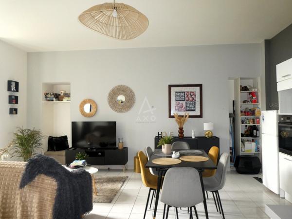 T2 en rez de jardin + place de parking