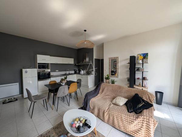 T2 en rez de jardin + place de parking