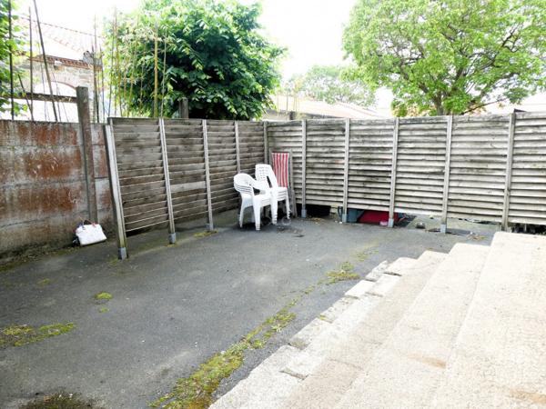 T2 en rez de jardin + place de parking