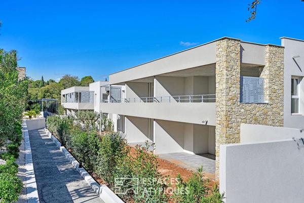 Appartement P4 avec terrasse, jardin, garages et ascenseur quartier Camplanier